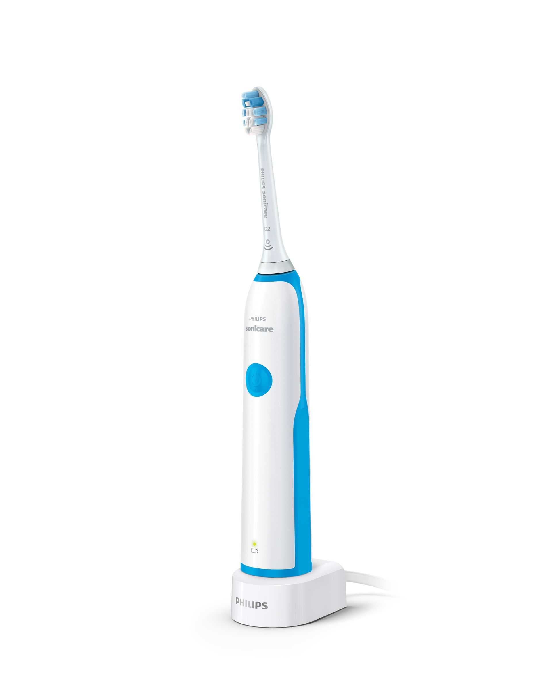 Cepillo de dientes eléctrico, blanco y azul, en base de carga, fondo blanco.