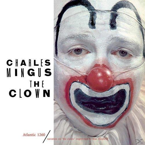 Charles Mingus album borítója. Egy bohóc arca fehér sminkkel, piros orral és fekete kiegészítőkkel.