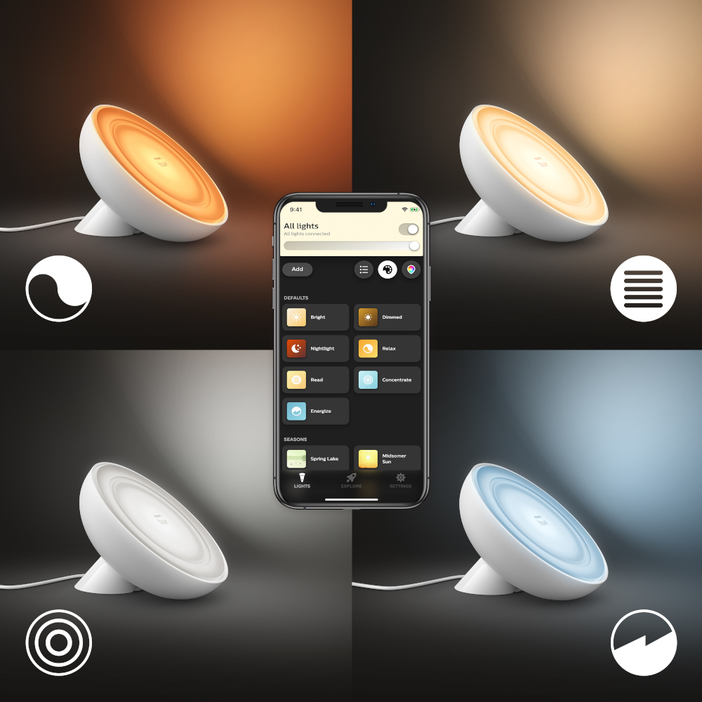 Philips Hue smart lights, with phone showing app interface.