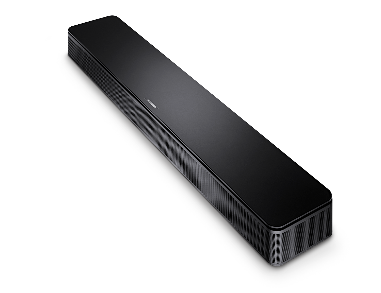 Een zwarte Bose soundbar op een zwart oppervlak. Het heeft een mesh voorkant en een Bose logo.