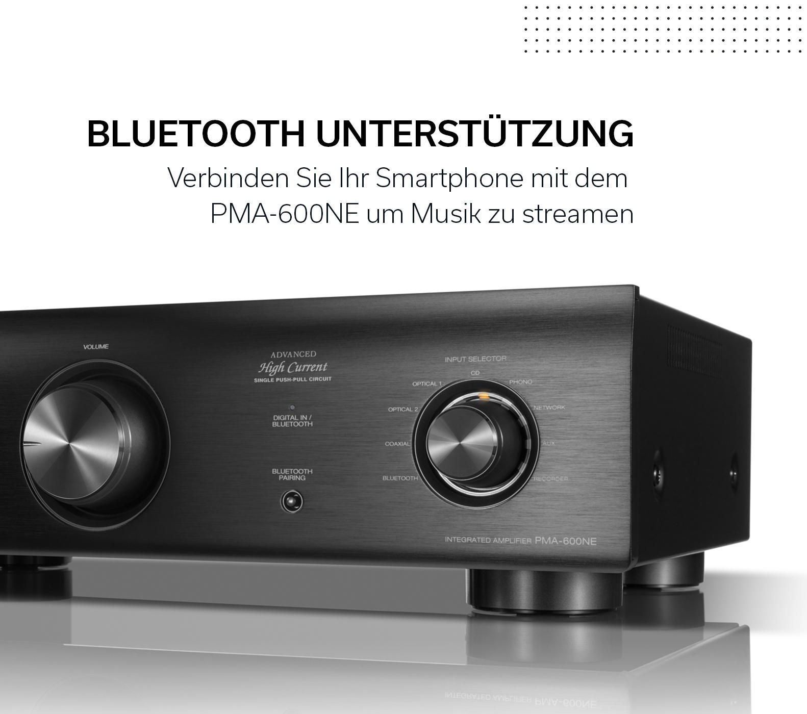 Ein schwarzer Audioverstärker mit Text und einem silbernen Drehknopf.