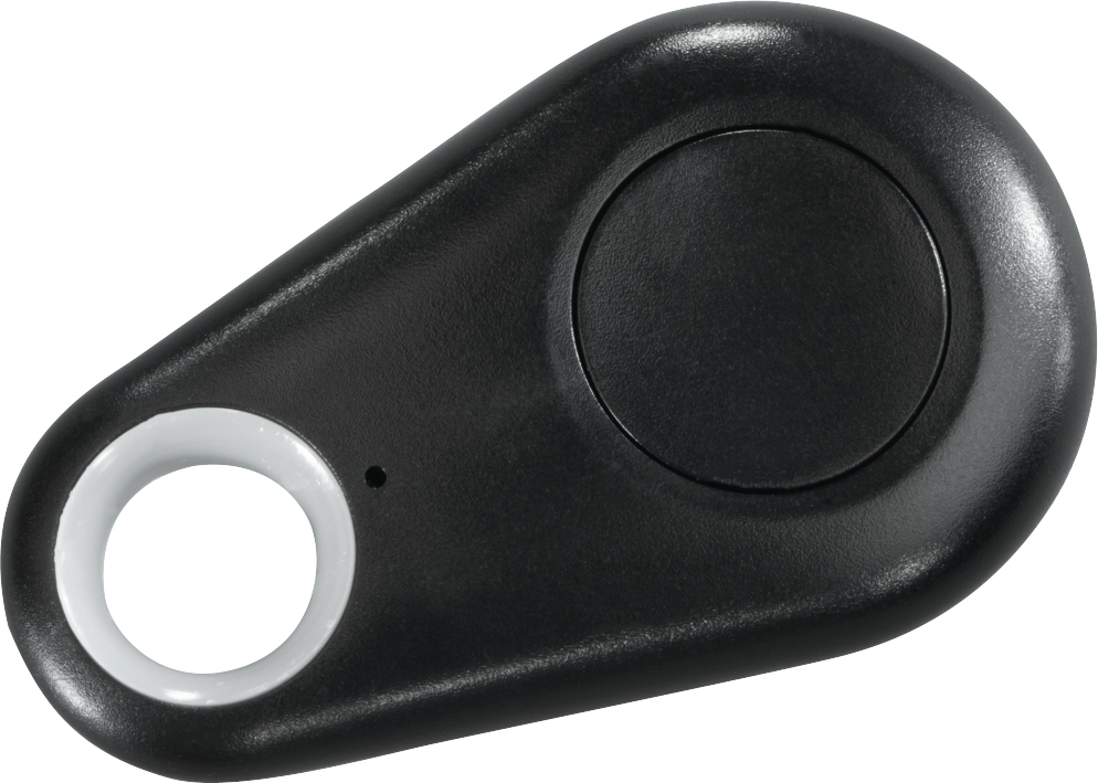 Appareil noir de forme ovale avec un anneau blanc et un bouton central. C'est un petit tracker.