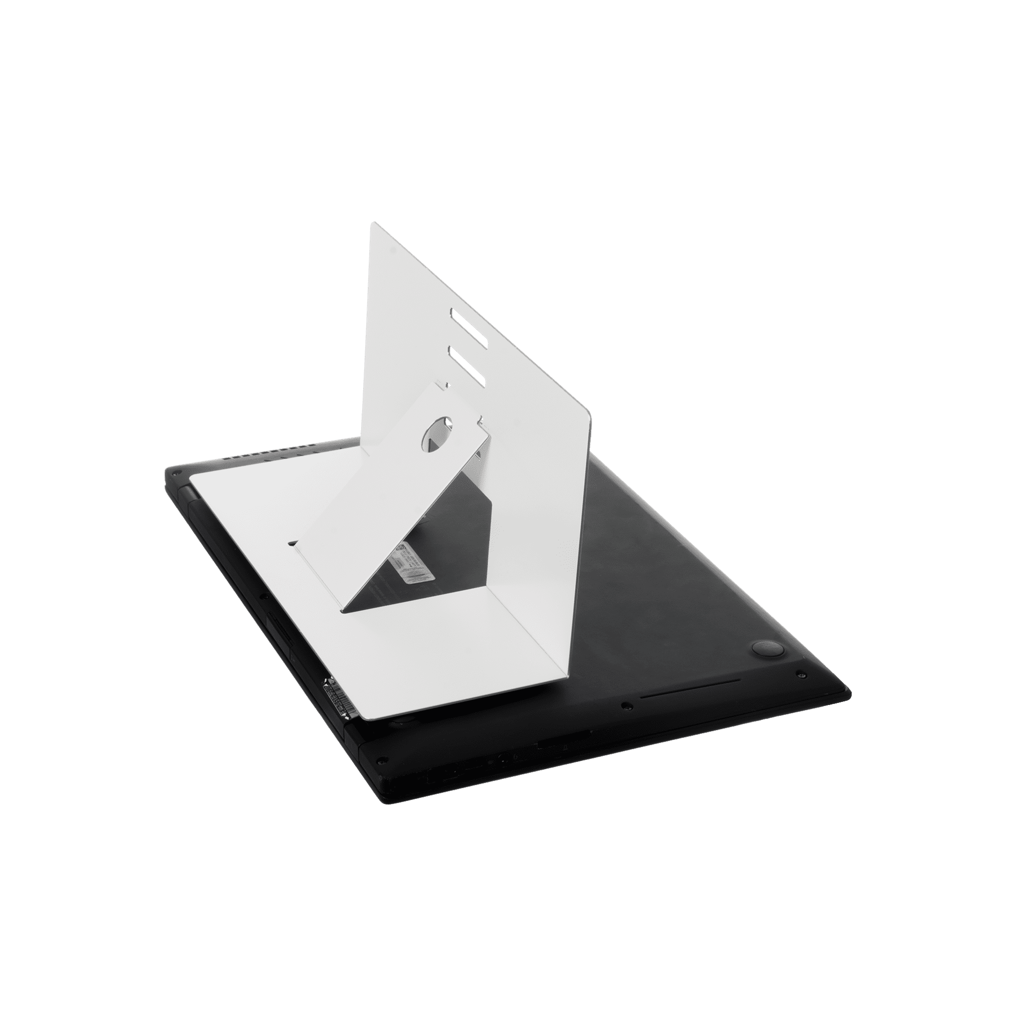 A black laptop with a white stand. The stand is holding the laptop at an angle. Green background.