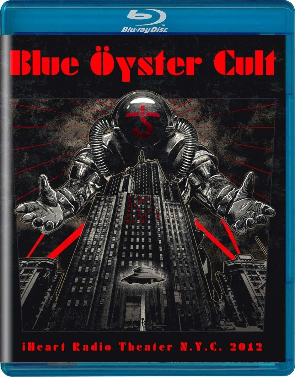 Blue Oyster Cult Blu-ray borító. Városkép egy figurával. Piros villámok.