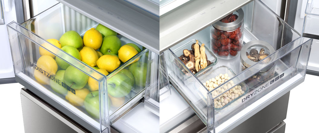 Cajones de refrigerador llenos de frutas y verduras, y otros artículos en recipientes transparentes.
