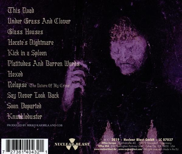 Rückseite eines Albumcovers mit einem lilafarbenen Gesicht.