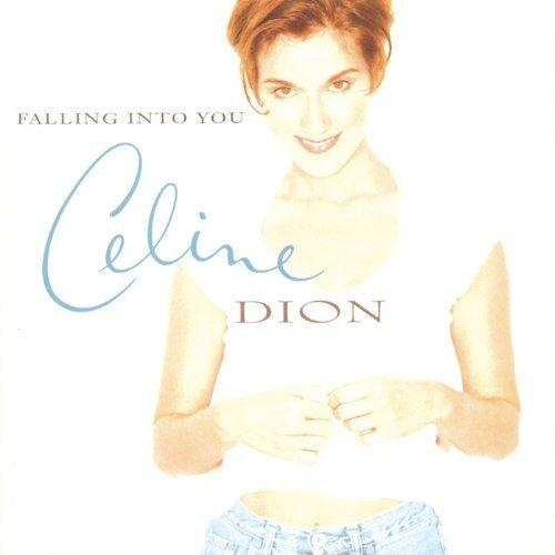 Celine Dion album borító. Egy nő fehér felsőben mosolyog. 'Falling Into You' cím és a neve.