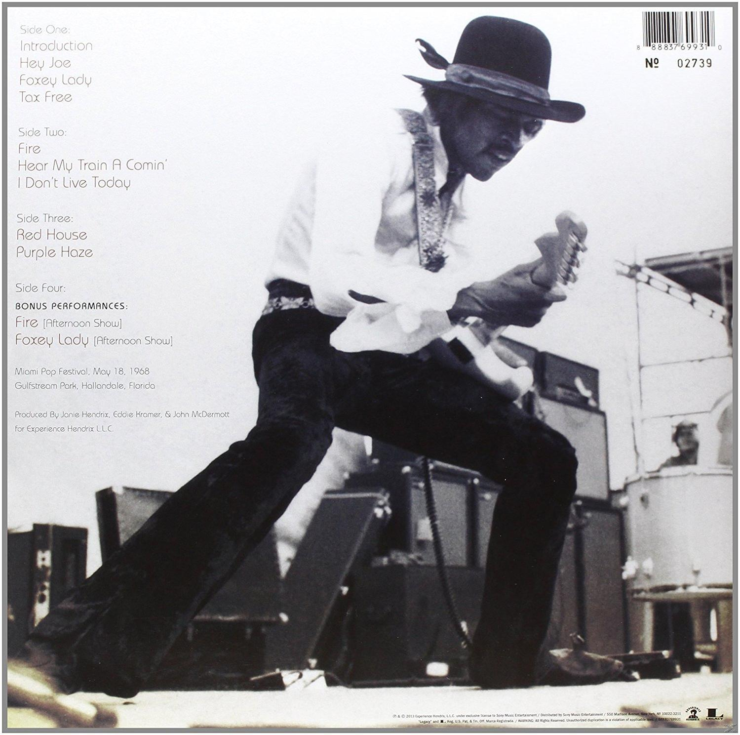 Vinyl lemez hátlapja Jimi Hendrix-szel és a dalcímekkel.