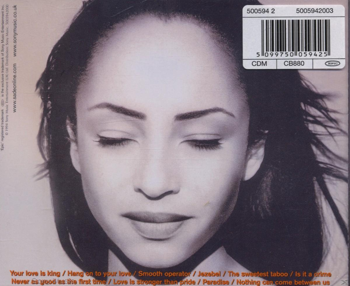Sade-Albumcover mit dem Gesicht einer Frau.