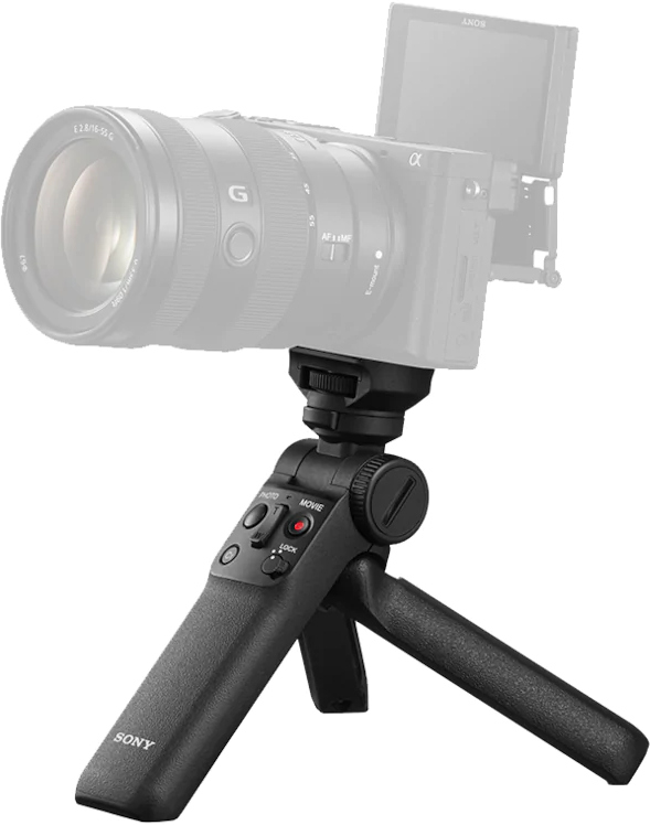 A Sony camera grip with a foldable tripod and lens.