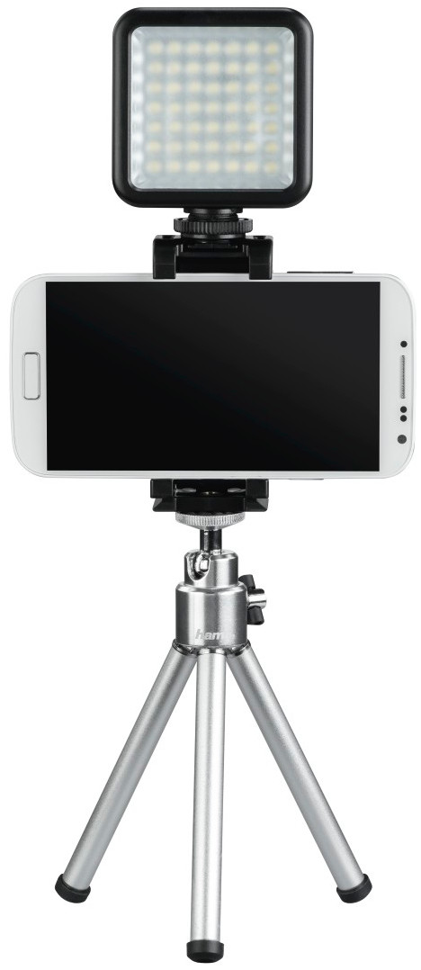 Smartphone on a tripod with a small LED light attached. White background.