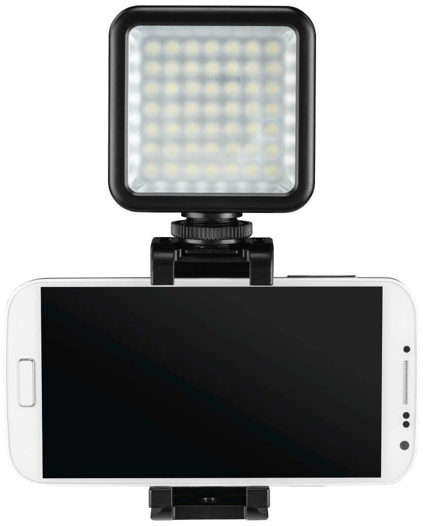 A white phone with a black screen is mounted on a black frame with a led light.