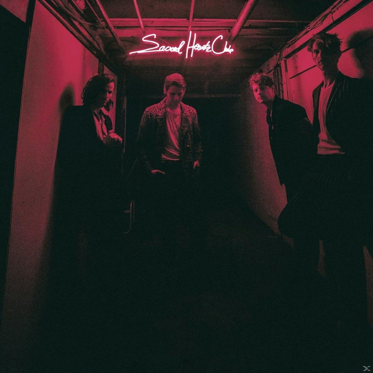 Album borító négy emberrel egy sötét folyosón. Szöveg: Second Hand Chic.