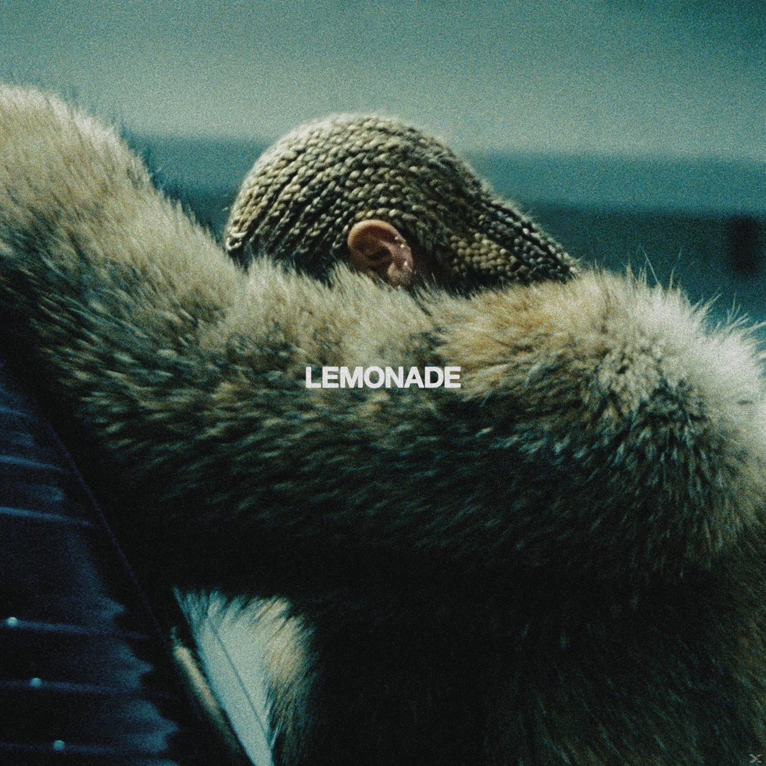 Album borító egy nővel, bundában. Az album címe: 'Lemonade', Beyoncé-tól.