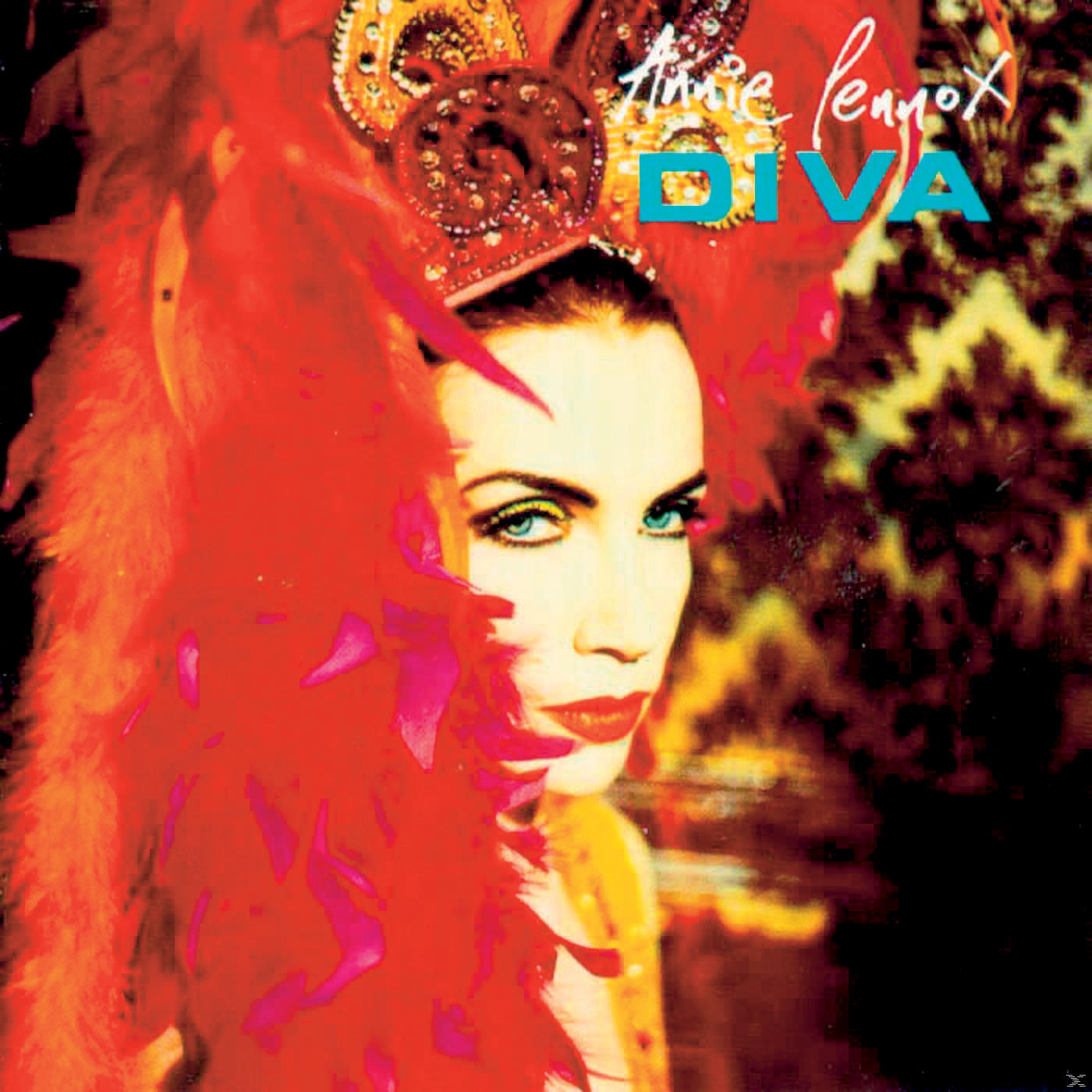 Annie Lennox Albumcover. Sie trägt einen großen roten Kopfschmuck mit Federn. Der Hintergrund hat ein Blumenmuster.
