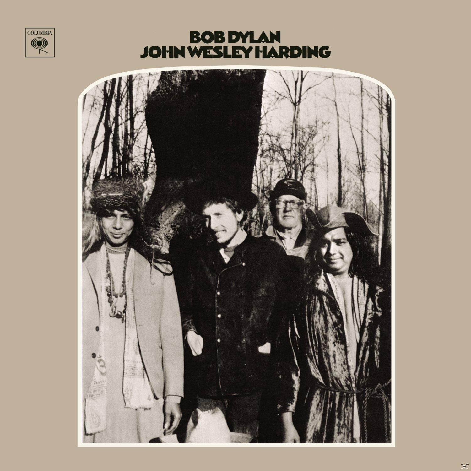 Bob Dylan album borítója, négy emberrel egy erdőben, fekete-fehér.