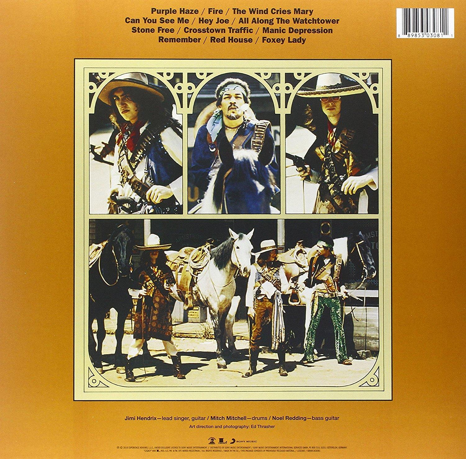 Album-Rückseite mit Gruppenfoto und Songtiteln. Braun-gelbes Farbschema.