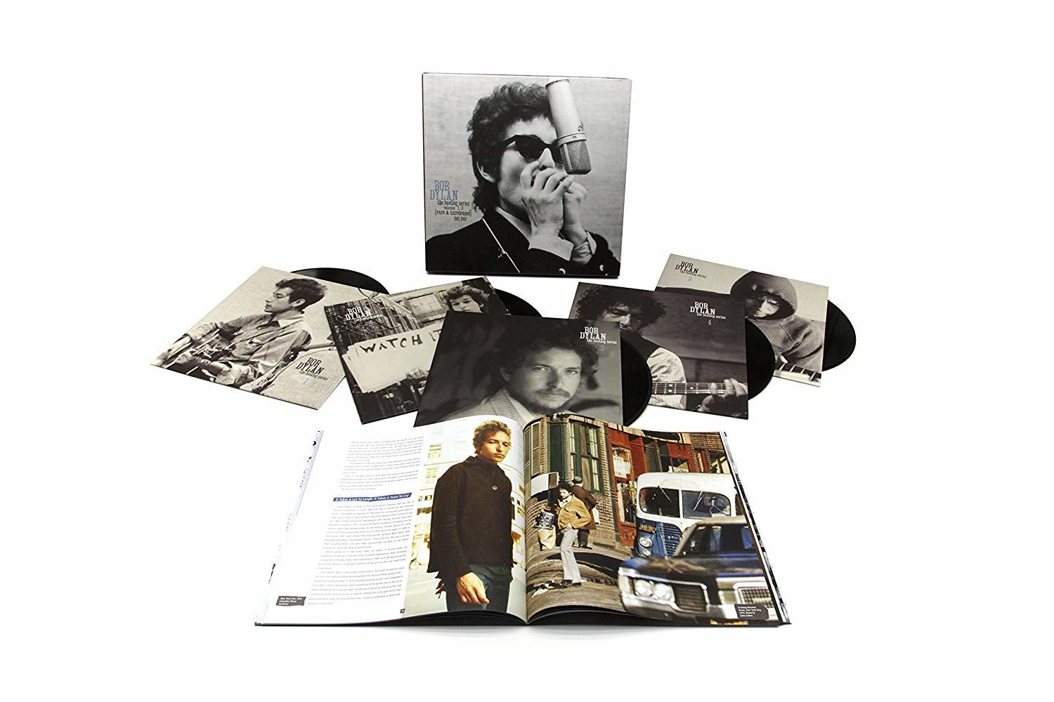 Bob Dylan Album-Set mit mehreren Albumcovern und einem Buch.