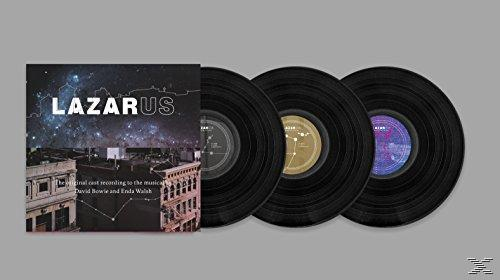 Albumcover und drei schwarze Vinylplatten auf grauem Untergrund. Album: Lazarus.