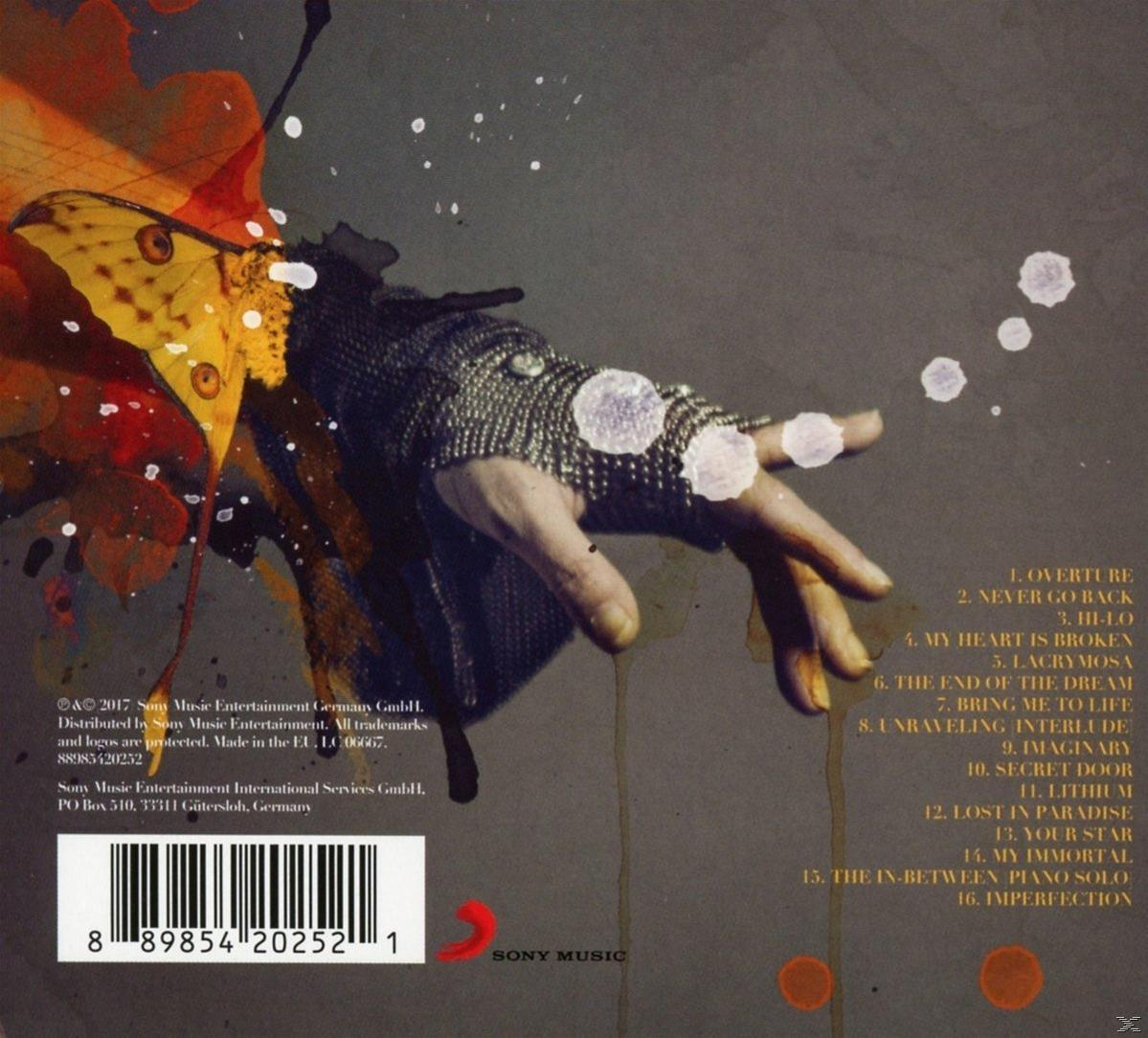 Album borító, kézzel, pillangóval és számlistával.