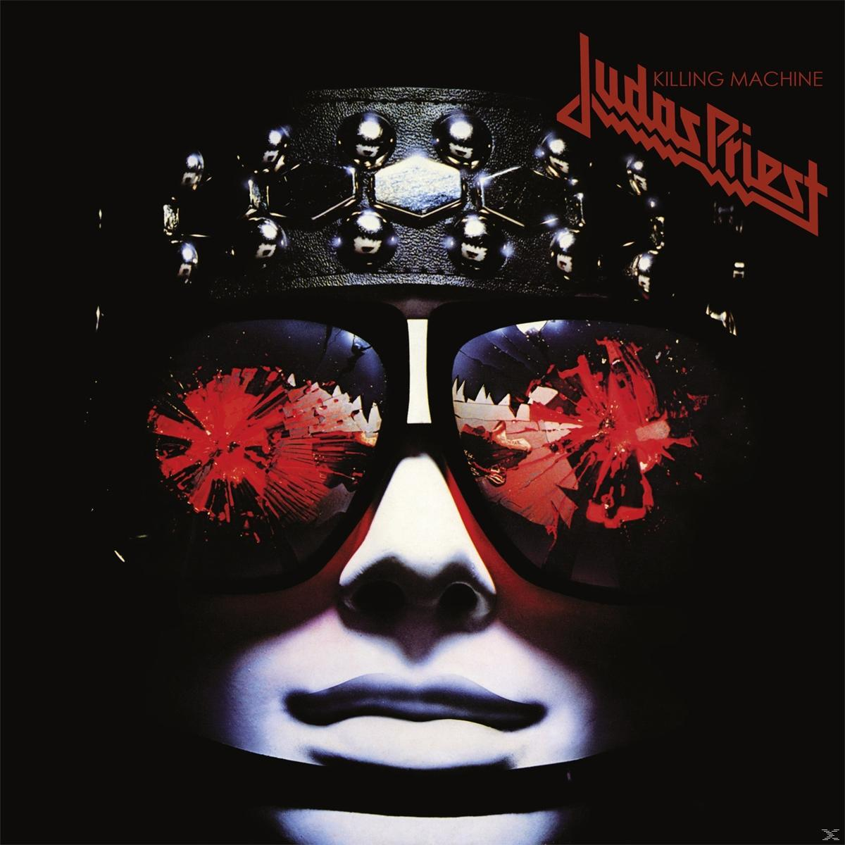 Judas Priest Albumcover. Ein Gesicht mit Sonnenbrille, die rote Ausbrüche reflektiert, ein mit Nieten besetzter Kopfschmuck und ein schwarzes Band.