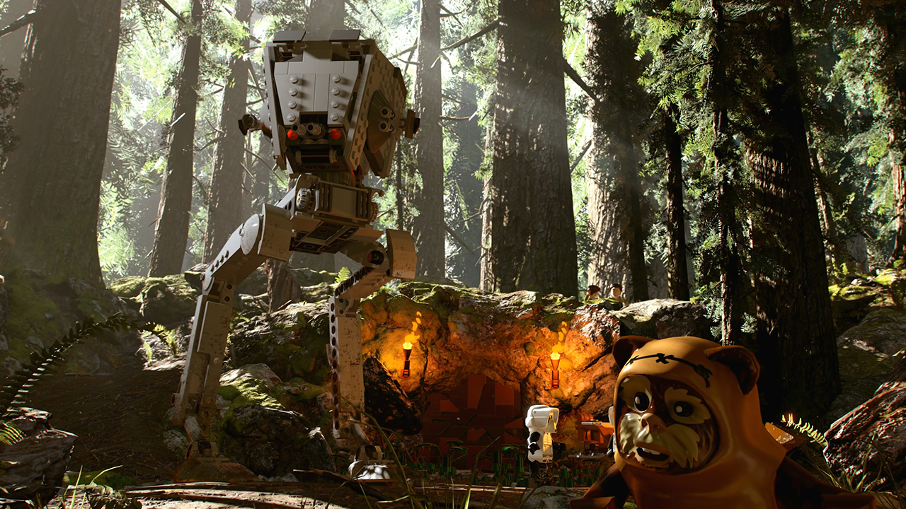 Scena Lego Star Wars con un camminatore AT-ST, un Ewok e un ingresso di una grotta in un ambiente forestale.