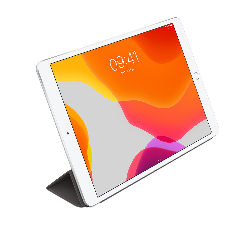 Renkli bir duvar kağıdı ile beyaz iPad Pro, beyaz zemin üzerine izole edilmiş.