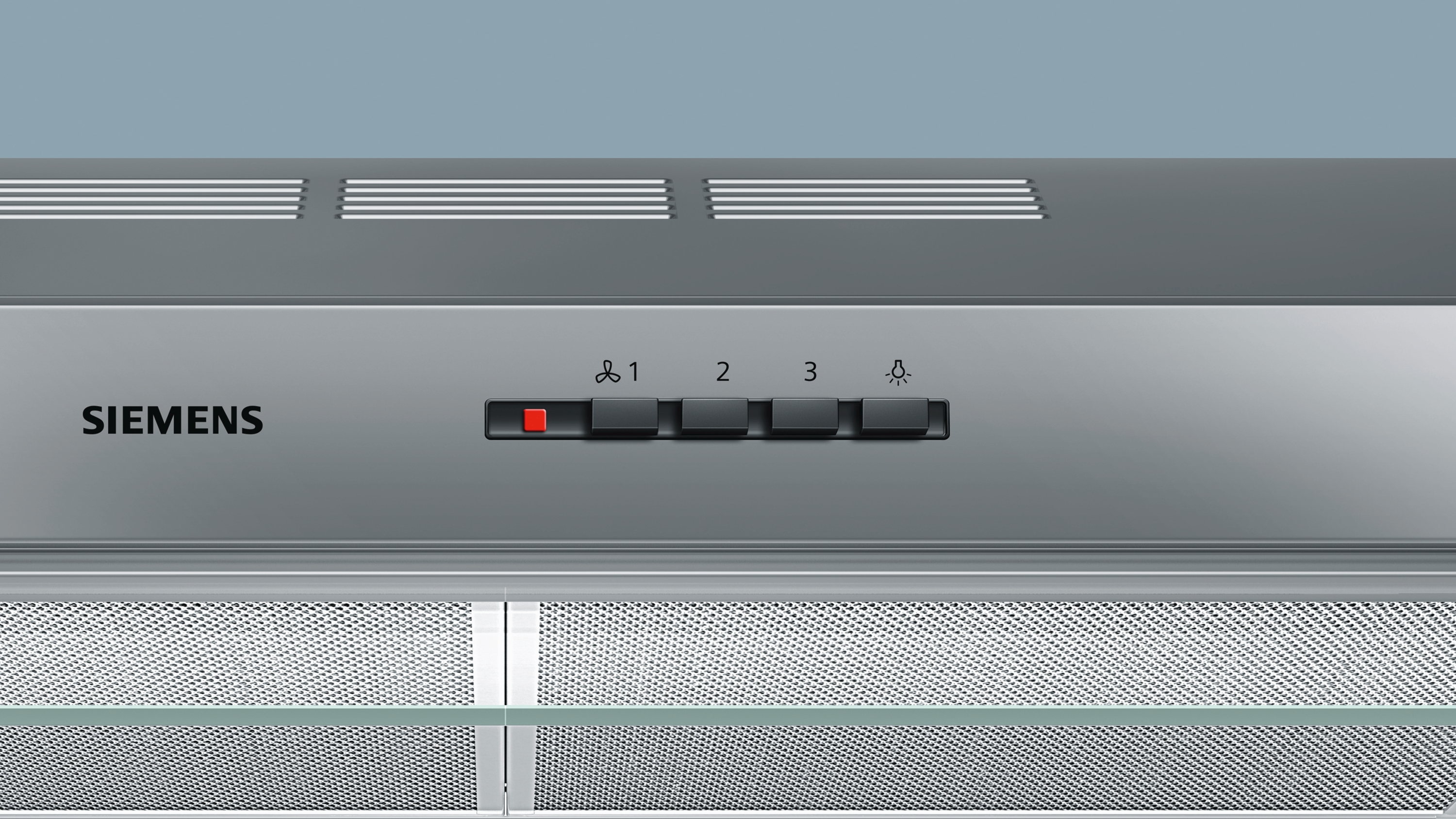 Close-up of Siemens range hood controls. Buttons for fan speed and light are visible.
