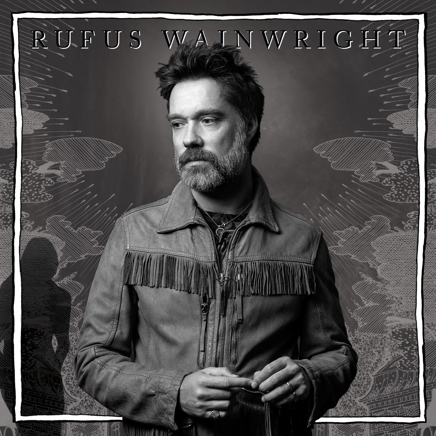 Rufus Wainwright album borítója, balra néző férfi, bőrdzseki, sötét háttér.