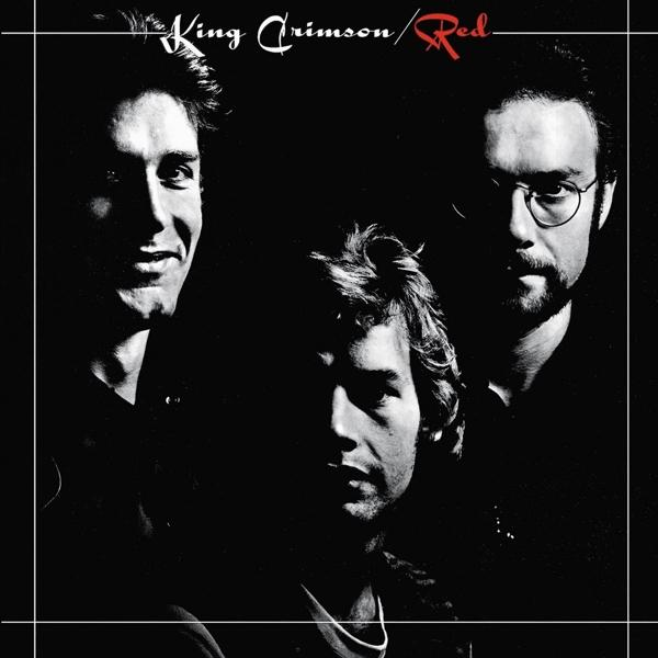 Album borító három férfival az árnyékban, felül a 'King Crimson / Red' felirattal.