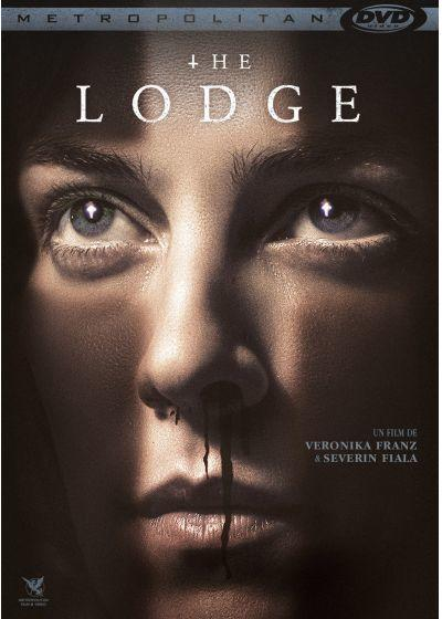 Movie poster: close-up of a woman's face with blood on her nose, title 'The Lodge'.