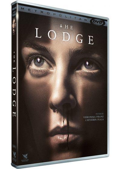 A DVD case for the movie 'The Lodge'. It has a woman's face and text on the cover.