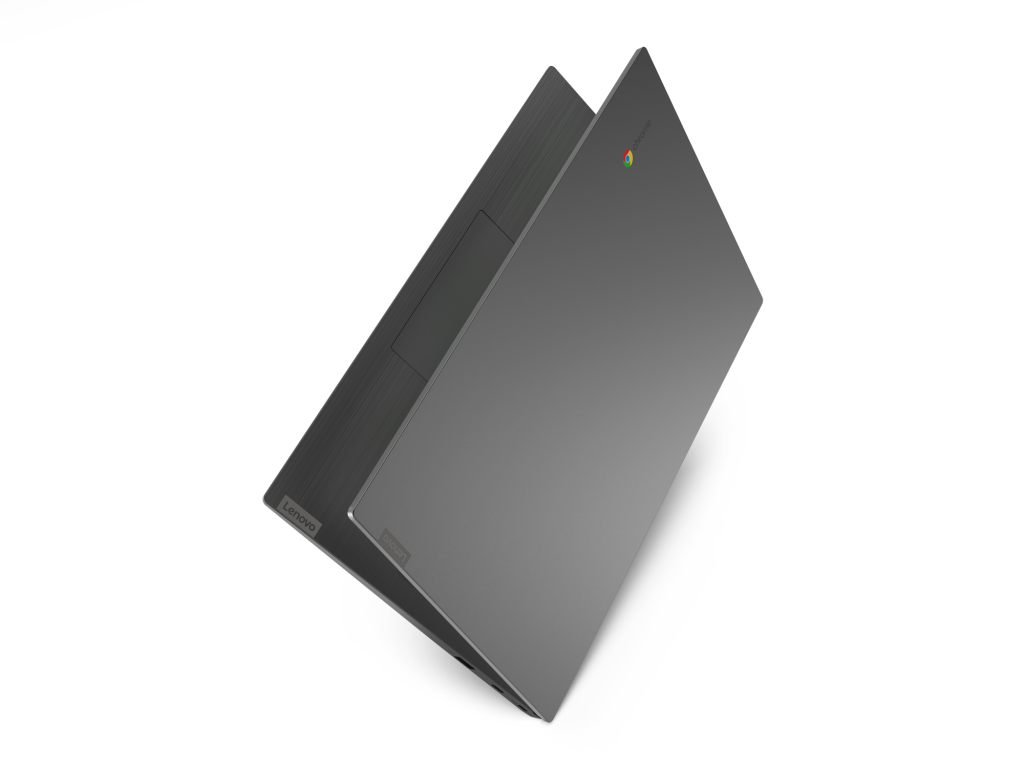 Un portátil Lenovo Chromebook abierto. Color gris, vista angular, fondo negro.
