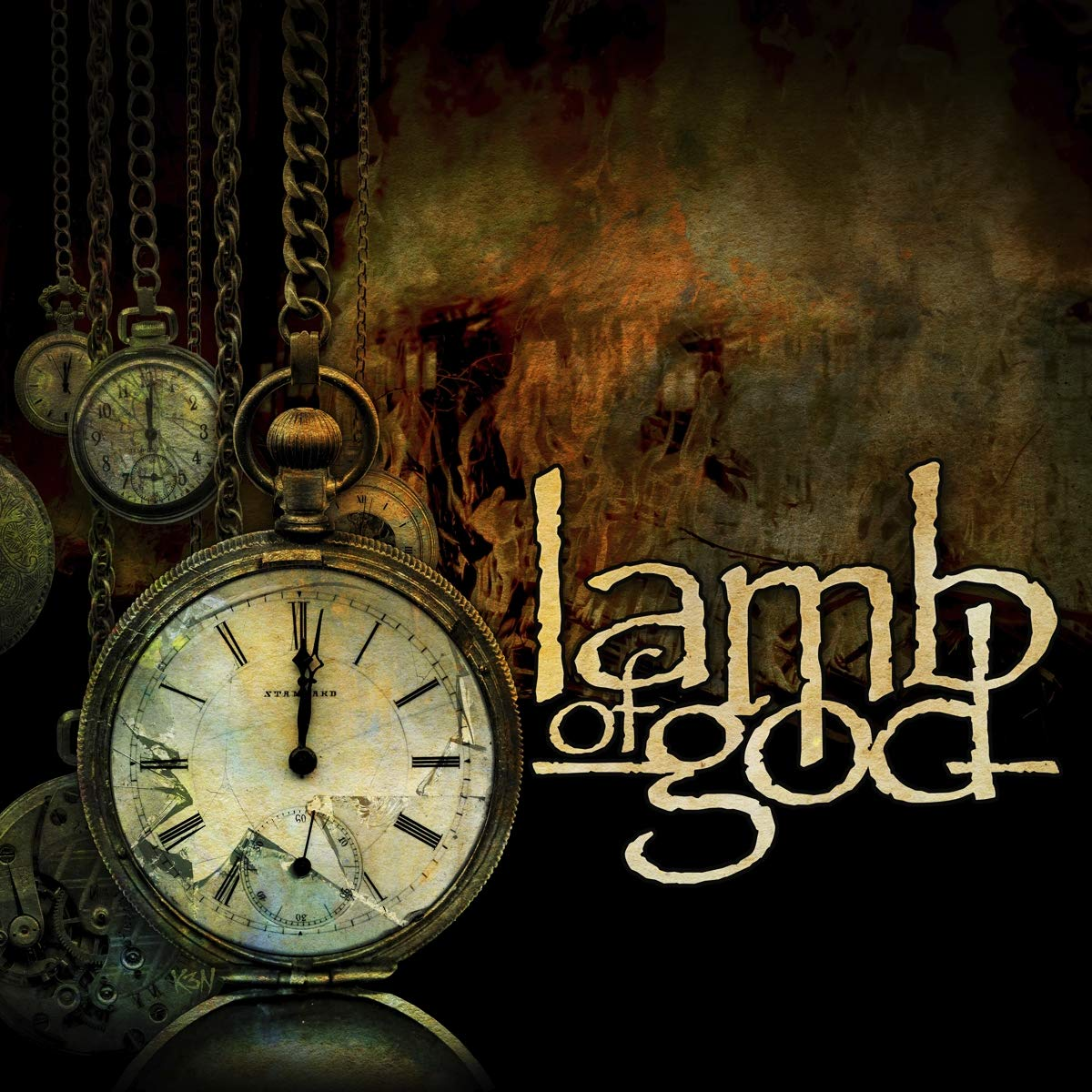 Album borító zsebórával, láncokkal és a 'Lamb of God' zenekar nevével.
