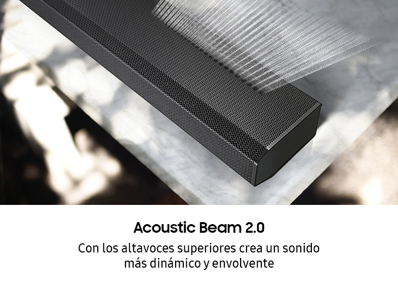Una barra de sonido negra con el texto "Acoustic Beam 2.0" y texto en español, sobre una superficie de mármol claro.
