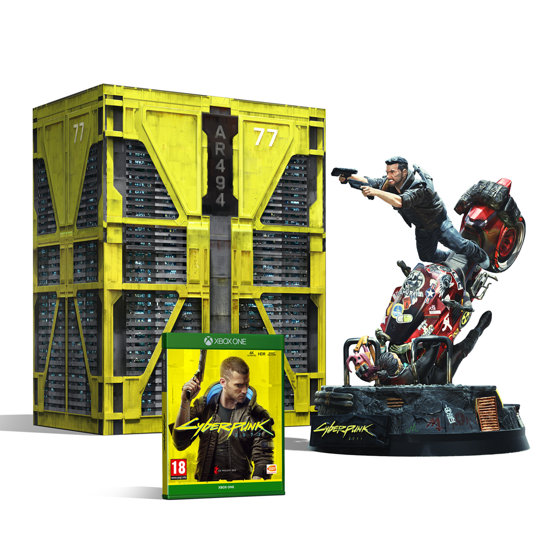 Set de caja Cyberpunk 2077 con juego y estatua. Contenedor amarillo y persona en moto.