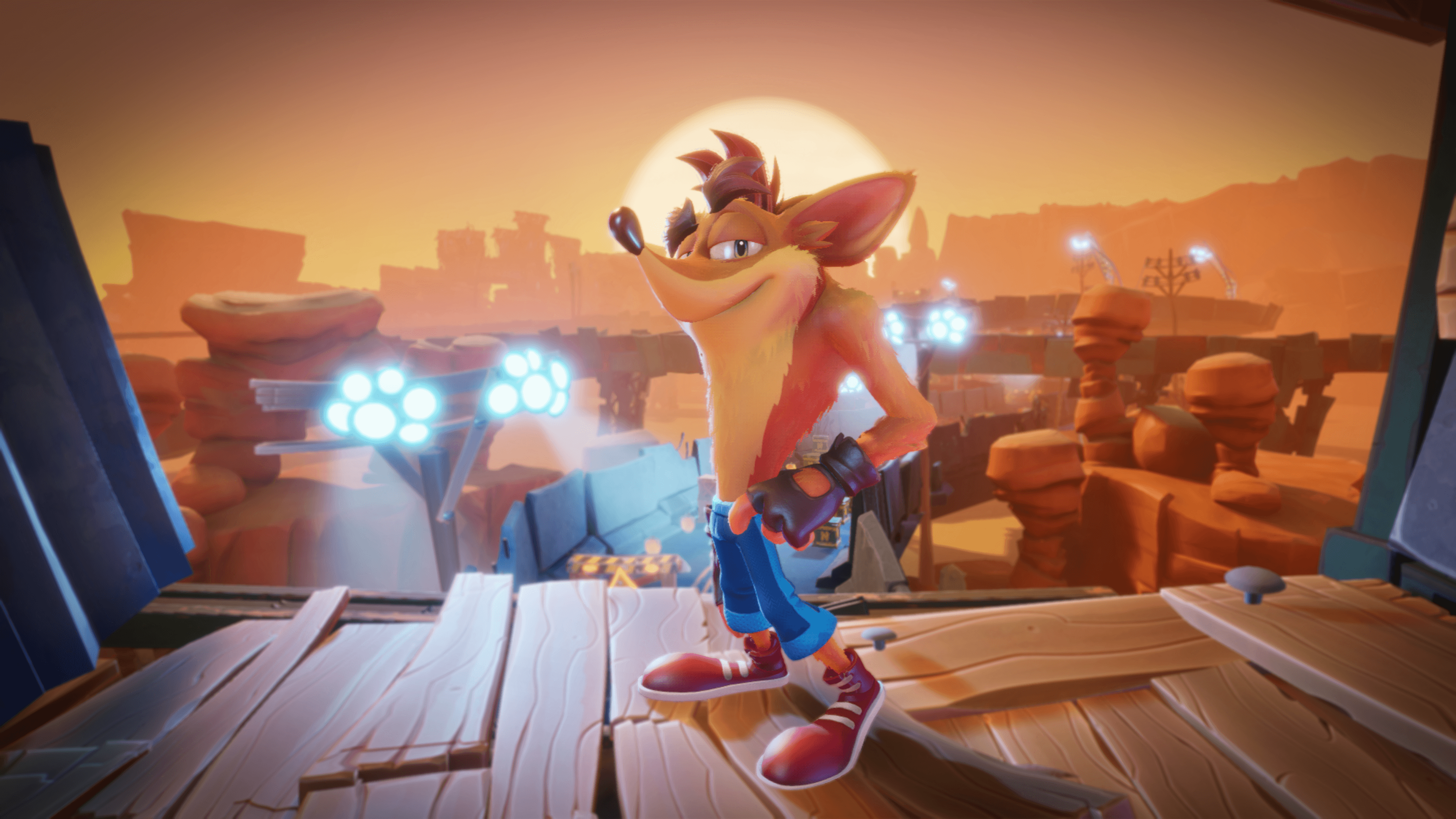Cartoonfigur Crash Bandicoot in einer Wüstenlandschaft, nach rechts blickend, lächelnd.