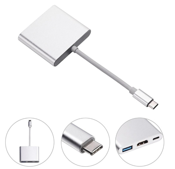 USB-C girişi ve çoklu çıkış portlarına sahip gümüş renkli bir adaptör. USB-C ve çıkış portlarının detayları gösteriliyor.