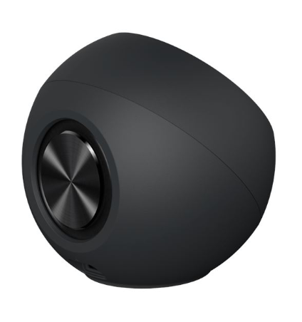 Altavoz negro y redondo con centro metálico sobre fondo blanco.
