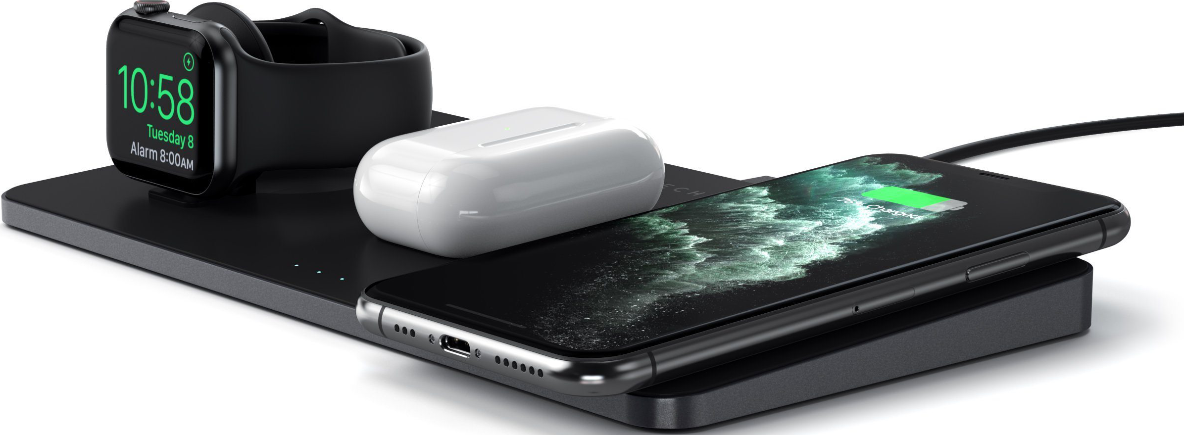 Un caricatore wireless con un Apple Watch, AirPods e un telefono in carica.
