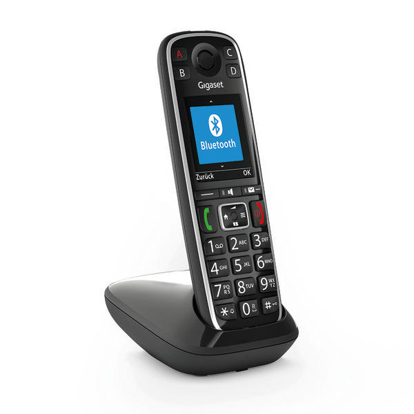 Schwarzes schnurloses Telefon mit blauem Bildschirm, der ein Bluetooth-Symbol anzeigt, auf schwarzer Basis.