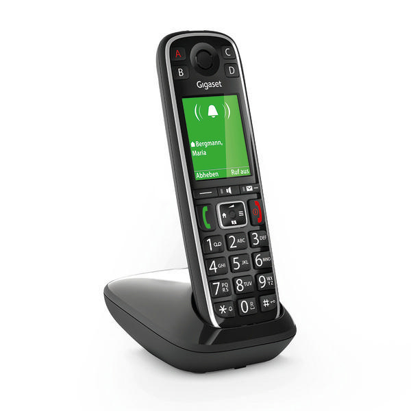 Ein schwarzes schnurloses Telefon liegt auf einer schwarzen Basis und zeigt einen Bildschirm.