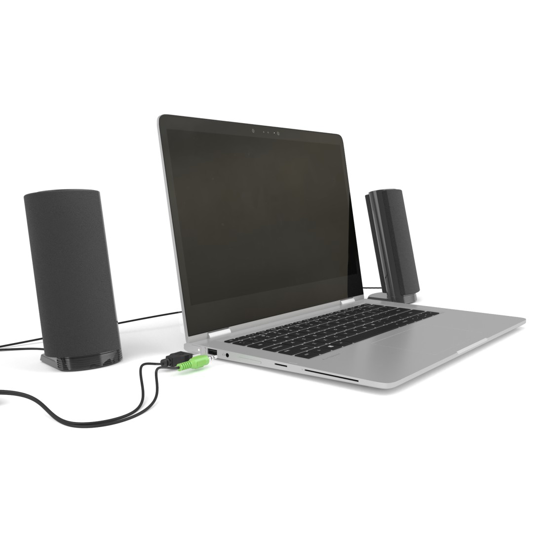 Ein Laptop mit Lautsprechern auf weißem Hintergrund. Der Laptop ist geöffnet, mit einem grünen Kabel.
