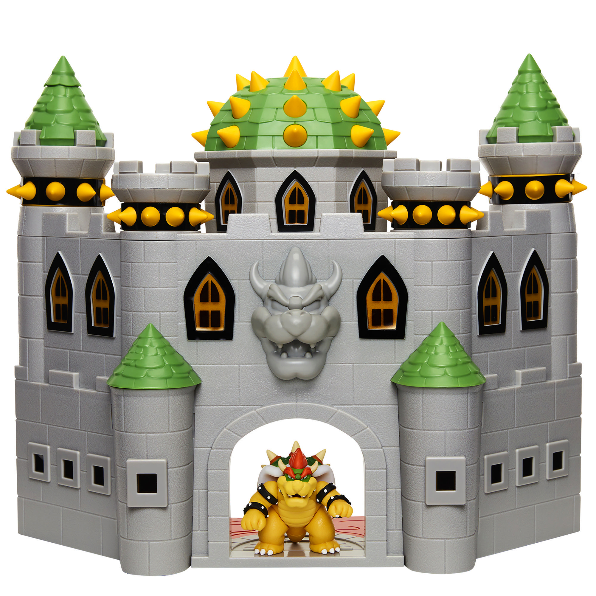 Graue Spielzeugburg mit grünen Türmen, gelben Stacheln und Bowser-Figur am Eingang.