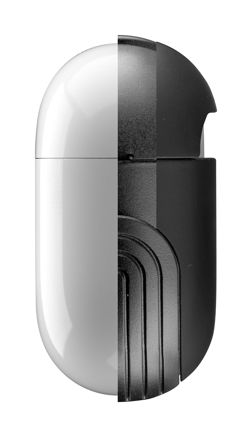 A white and black capsule-shaped object, split down the middle. It is on a white background.