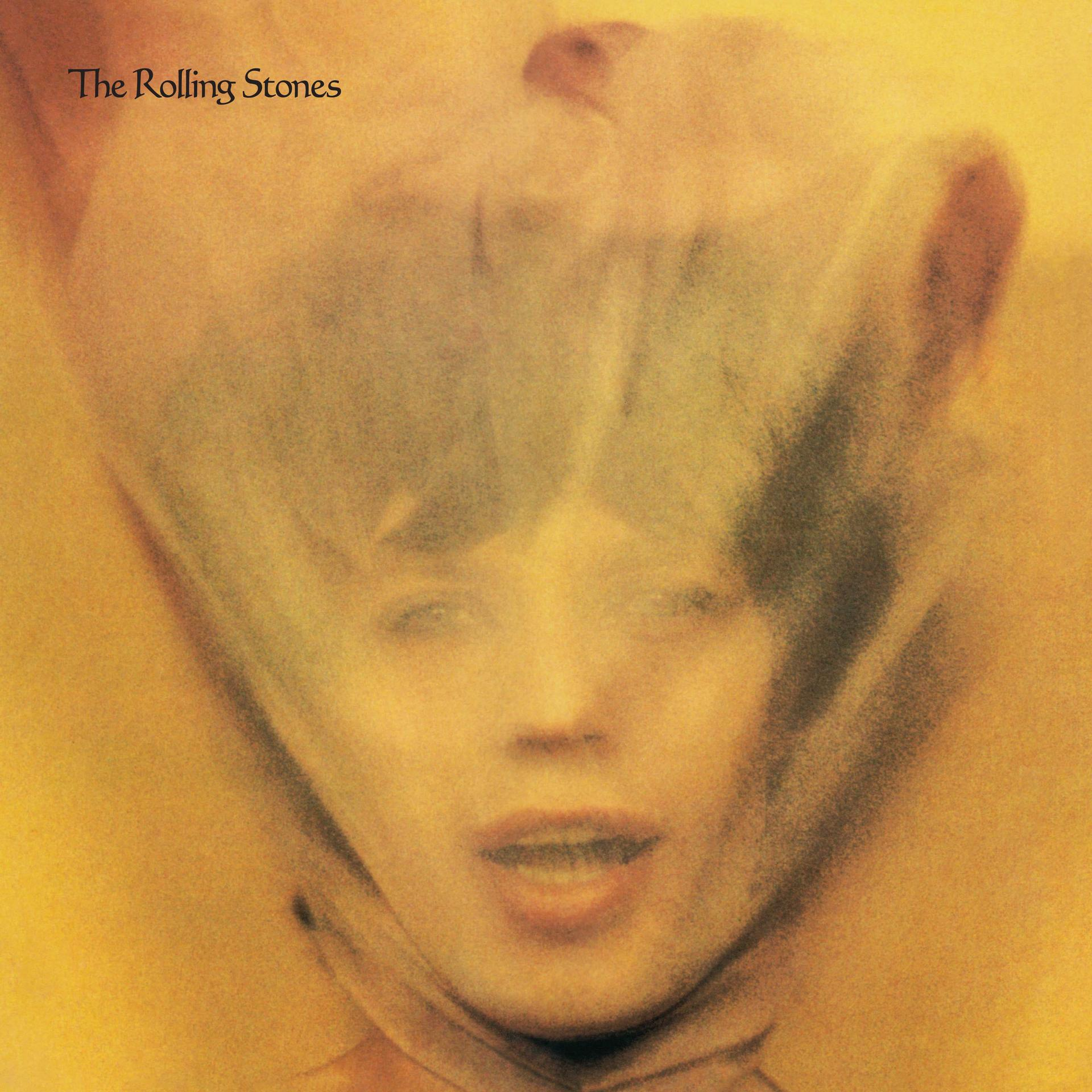 De albumhoes van The Rolling Stones, een gezicht bedekt met een doorschijnend materiaal, met een gele achtergrond.