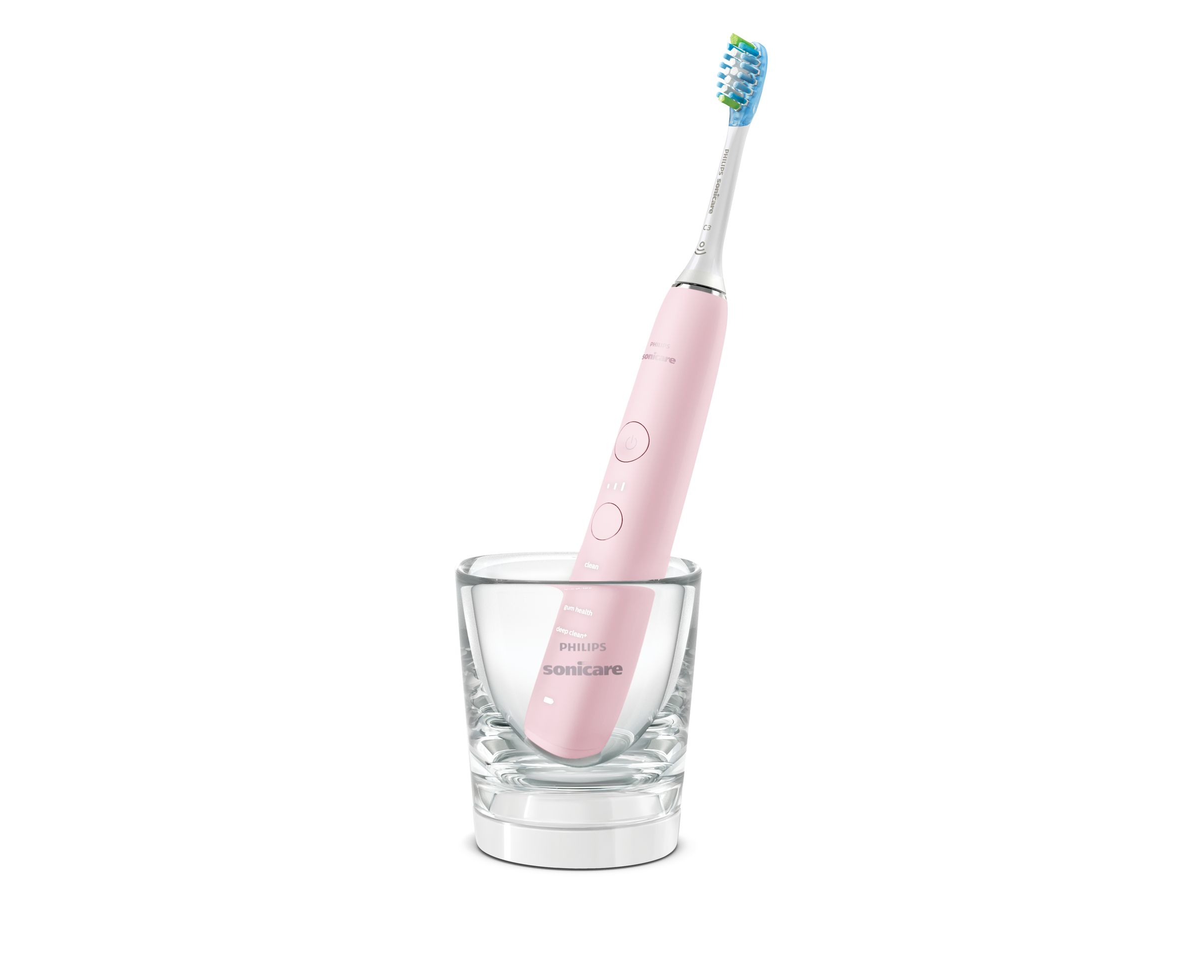 Pinke Philips Sonicare Zahnbürste in einem klaren Glas. Weißer Hintergrund.