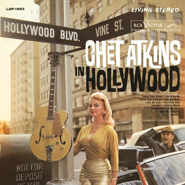Album borító nővel gitár mellett, Hollywood Blvd táblával, mögötte egy férfival.