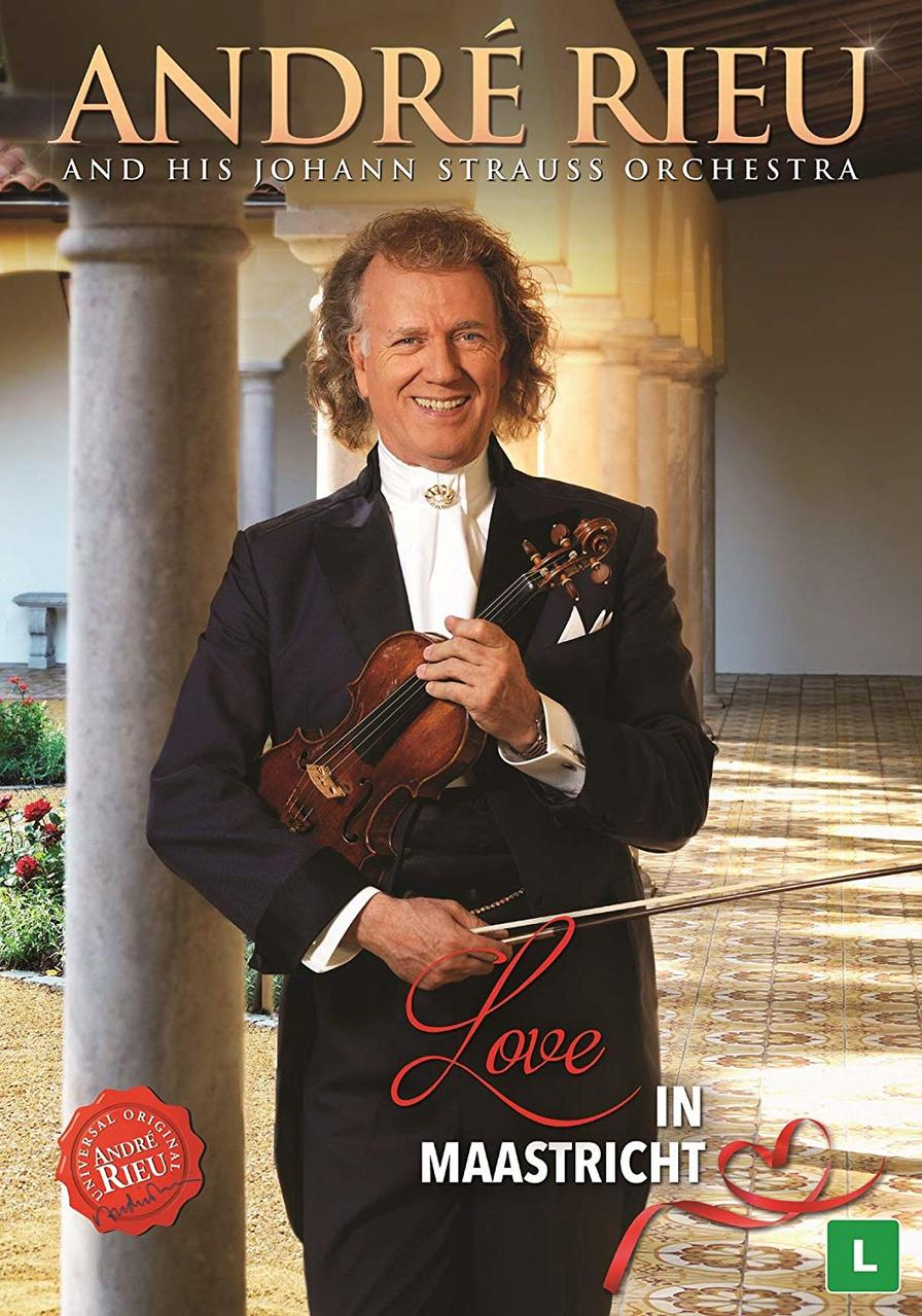 DVD-hoes met André Rieu, met viool, in pak. Achtergrond: zuilen.