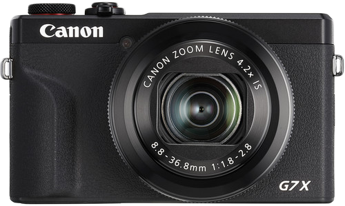 Fekete Canon digitális fényképezőgép zoomobjektívvel és G7X típusszámmal.
